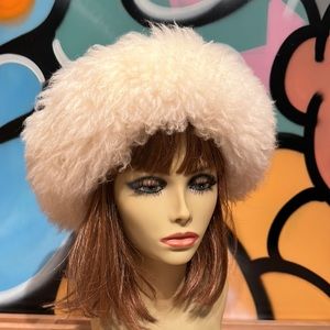 Let is Snow!!  Pure Sheepskin hat with fur lining.